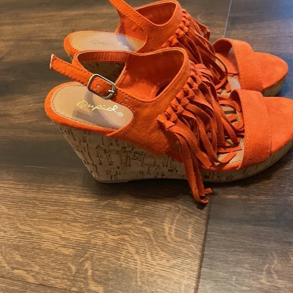 QUPID burnt orange suede fringe wedges.